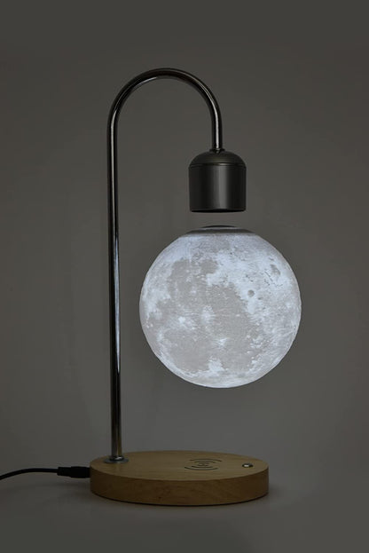 Luminária lua flutuante com levitação magnética e carregador sem fio e por indução acoplado para celular