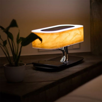 Multifunction tree lamp – wireless and induction charger coupled to cell phone with Bluetooth 4.0