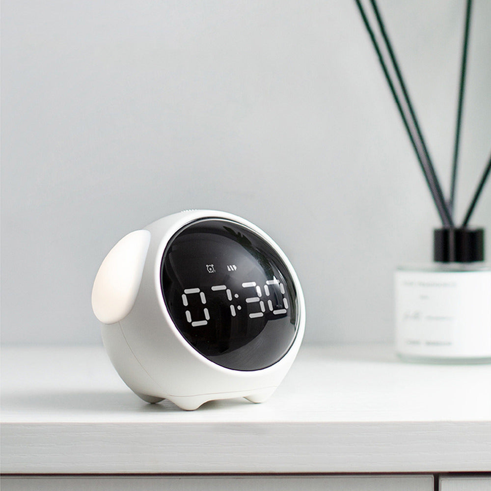 Digital desk clock/alarm clock with lamp and interactive pixel expression