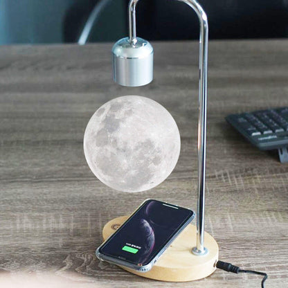 Schwebende Mondlampe mit Magnetschwebebahn und angeschlossenem kabellosem und Induktionsladegerät für Mobiltelefone
